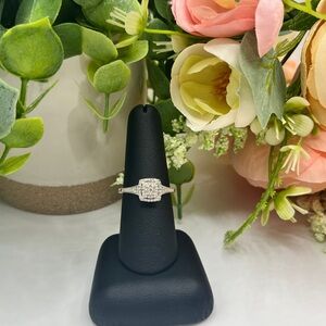 Elegant Silver Ring with Diamond Accents